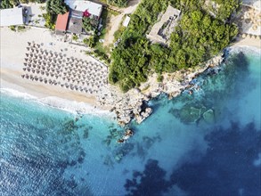 Top Down over Umbrellas and Beach in Himare from a drone, Albanian Riviera, Albania, Europe