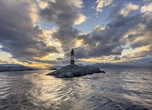 Lighthouse Faro Les Eclaireurs at sunset, dramatic clouds, Beagle Channel, Tierra del Fuego, Tierra