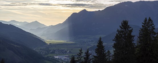 Sunlight falls on the Liesingtal valley and on the village of Traboch, Schoberpass federal road,