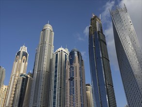 Several modern skyscrapers in front of a clear blue sky, Dubai, Arab Emirates