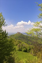 Hohenzollern Castle near Hechingen, cloudy sky, Zollernalbkreis, Swabian Alb, Baden-Wuerttemberg,