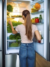 A young woman stands in front of the open fridge with lots of vegetables in it, healthy eating, AI