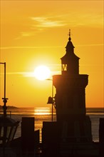 Pingelturm, historical lighthouse, picturesque, golden, beautiful sunset, silhouette in front of