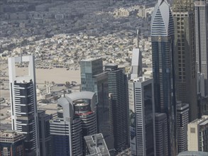 Close-up of towering high-rise buildings and skyscrapers in a dense urban landscape, view of a