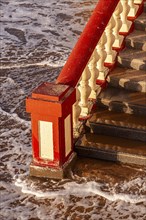 Stairs by the sea in Chipiona, Andalusia, Spain, Europe