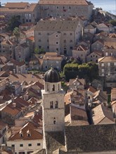 The old town of Dubrovnik with its historic houses, churches, red roofs and fortress walls,