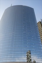 Modern Skyscraper with Skyscraper Reflection in a Sunny Day in Milan, Lombardy, Italy, Europe