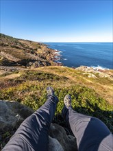 Moments of peace sitting on a rock looking at the sea on Mount Jaizkibel next to San Sebastian,