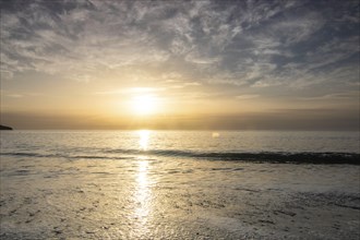 Sunrise over the sea, view into the Atlantic. on the beach of Tarajalejo on Fuerteventura, Canary