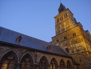 Gothic church during the blue hour, warm lighting from inside, Maastricht, Netherlands