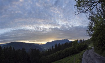 Sunset over the Eisenerz Alps, mountain massif Reiting, in the Liesingtal the village Traboch,