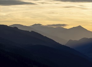 Sunset over a mountain peak, view from the lowlands, Leoben, Styria, Austria, Europe