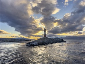 Lighthouse Faro Les Eclaireurs at sunset, dramatic clouds, Beagle Channel, Tierra del Fuego, Tierra