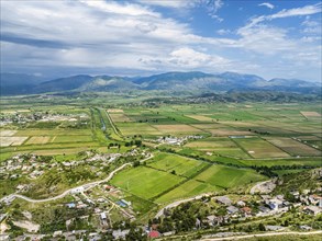 Fields and Mountains from a drone over Lekursi Castle on Lekursi Hill over Saranada, Albanian