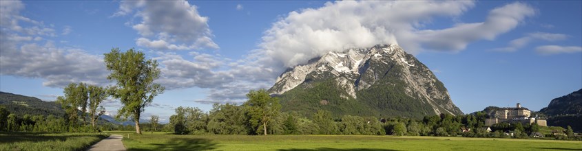 Grimming mountain range, Trautenfels Castle in the morning light, panoramic view, near Irdning,