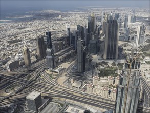 Comprehensive panorama of Dubai with skyscrapers, high-rise buildings and a complex network of