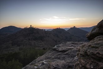View of Trifels Castle, from Engels Landing rock, with the young tower in autumn at sunset.