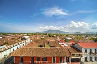 View of the tiled roofs of the colorful buildings in Granada, Nicaragua. Top view of the facade of