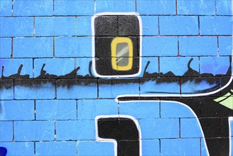 Barcelona, Catalonia, Spain, Europe, Plain graffiti on blue brick wall with number and bar motifs,