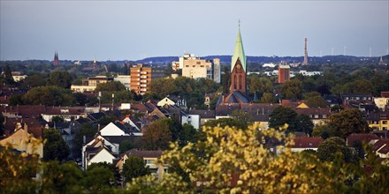 View from the Pluto spoil tip to Wanne-Eickel with the church tower of St Laurentius, Herne, Ruhr