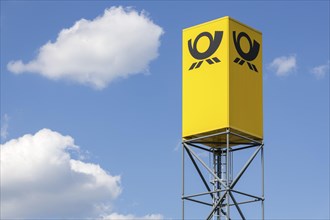 Deutsche Post logo on a scaffold, DHL, blue sky with clouds, Baden-Wuerttemberg, Germany, Europe