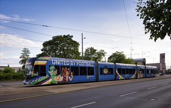 Tram, whole-car advertising for the EURO 2024, European Football Championship, Leipzig, logo,