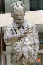 A bronze sculpture of a man in modern style, detailed view of a face, Willy Brandt House, SPD