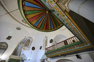 Retzep Pasha Mosque, Colourful painted ceiling of the interior of a mosque with decorative elements