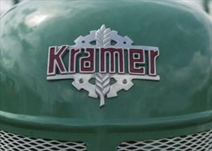 Kramer tractor, company logo, sheet metal problem on green painted bonnet, Offenbach, Dreieich,