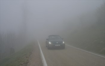 Fog, low visibility, road, forest on Blauen mountain, Badenweiler, Black Forest,