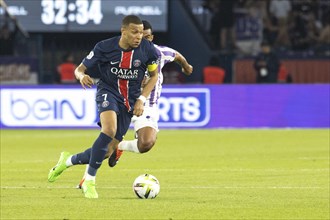 Football match, captain Kylian MBAPPE' Paris St. Germain running on the ball to the right, Cristian