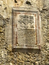 Historical inscription on classical arch bridge in stone in Venetian architectural style Venetian