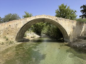 Frontal view of historic classical arched stone bridge in Venetian architectural style Venetian