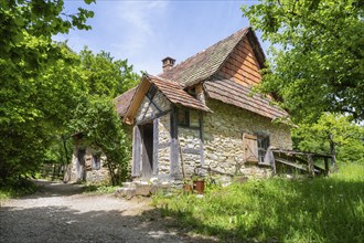 Traditional stone house built with Jura limestone, kiln, pottery, built in 1826, original location: