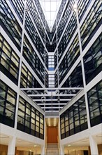 Interior view of a modern office building with glass facade and staircase, Willy-Brandt-Haus, SPD
