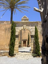 View of Tor gate access to building in north wing north wing of Arkadi Monastery with historic