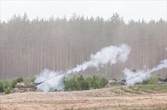 2000 self-propelled howitzers fire in a simulated combat situation during the NATO Steadfast