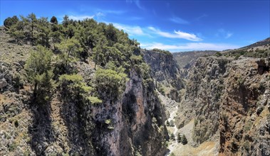 View to the south-west from bridge to south-west over deep narrow Aradena gorge to steep craggy
