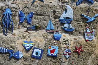 Various blue wall decorations with sea motifs on a stone wall, Old Town of Rhodes, Rhodes Town,