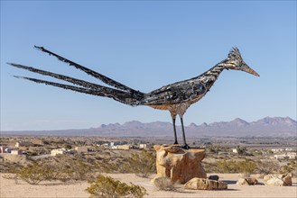 Giant Recycled Roadrunner statue made entirely from discarded materials by artist Olin Calk at an