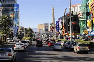 Las Vegas, Nevada, USA, North America, A busy street with cars and an Eiffel Tower replica as well