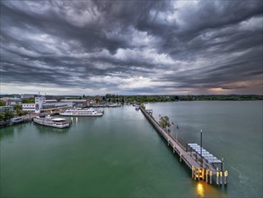 View from the Moleturm to the harbour of Friedrichshafen, ships, cloudy atmosphere at sunset, Lake