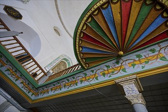 Retzep Pasha Mosque, Colourfully decorated ceiling and balcony in the interior of a mosque with
