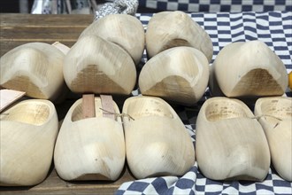 Dutch wooden clogs on display at a street market in Holland. Alkmaar, Netherlands