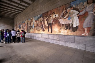 Tour group, tourist group, tourists on a guided city tour, mural Aufbau der Republik made of