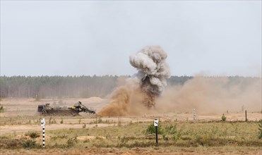 A Keiler armoured mine sweeper triggers an explosion, taken during the NATO large-scale manoeuvre