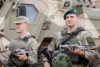 A Lithuanian army drone pilot holds a reconnaissance drone, taken during the NATO Steadfast
