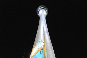 Las Vegas, Nevada, USA, North America, Illuminated tower stretching upwards at night, Las Vegas