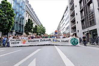 Demonstrators with signs at Fridays for Future, taken during the climate strike for the EU