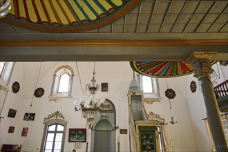 Retzep Pasha Mosque, interior view of a mosque with high dome, chandelier and traditional Islamic